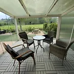 Alpesi faház Glass Veranda In Nature